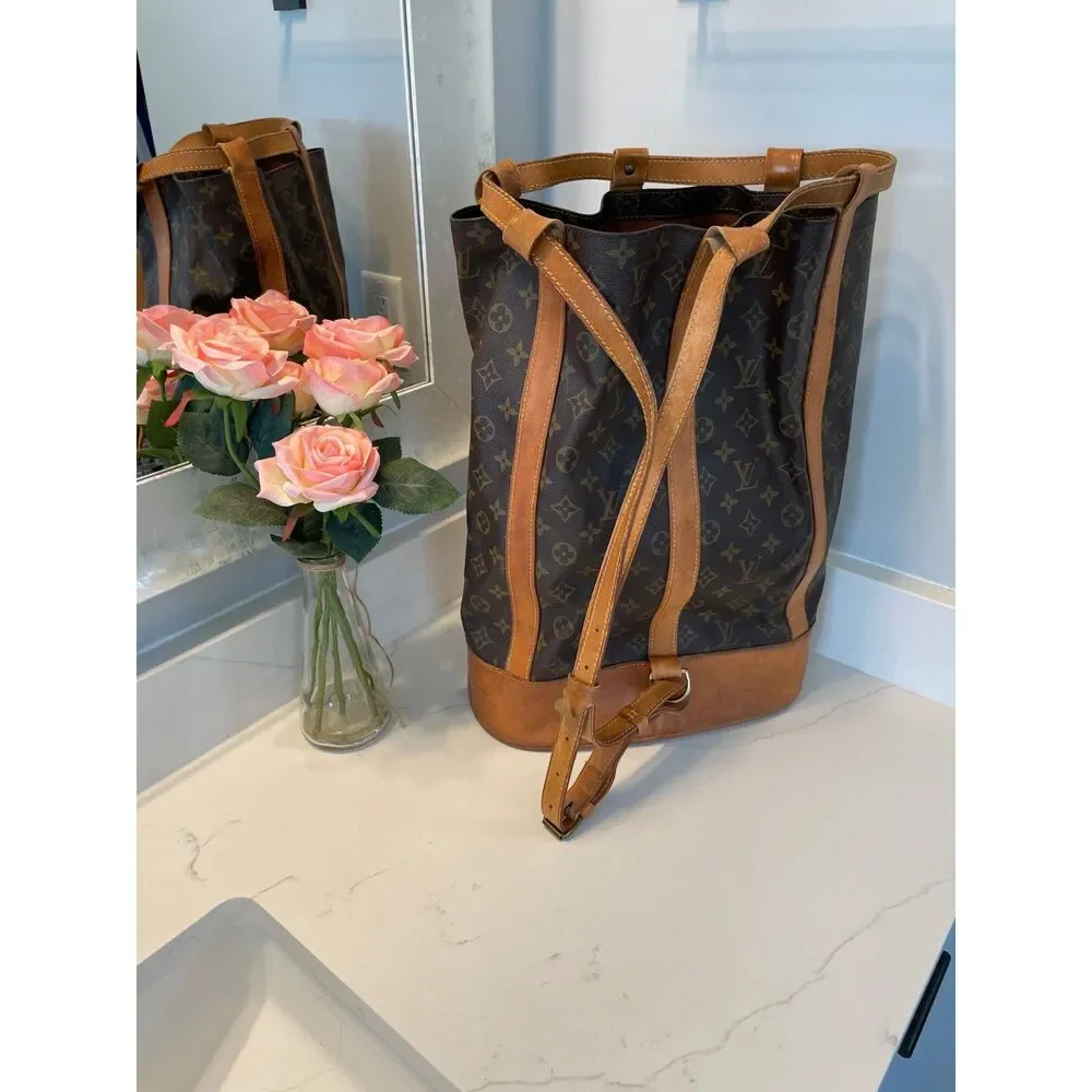 Louis Vuitton Authentic Randonnee PM Monogram Hobo Backpack Bag